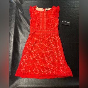 Woman’s red lace dress